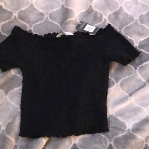 Black off the shoulder shirt